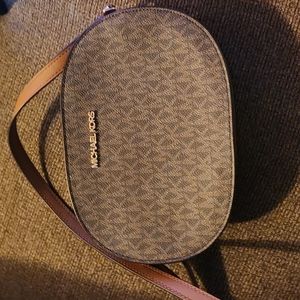 Authentic Michael kors  camera cross body bag .